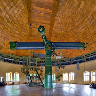 Telescope in horizontal position inside the dome